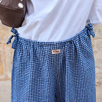 Détail de la coupe ballon du pantalon baggiu Giu